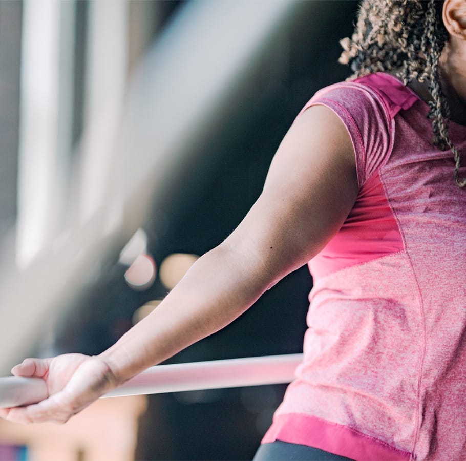 woman stretching and working out from her home