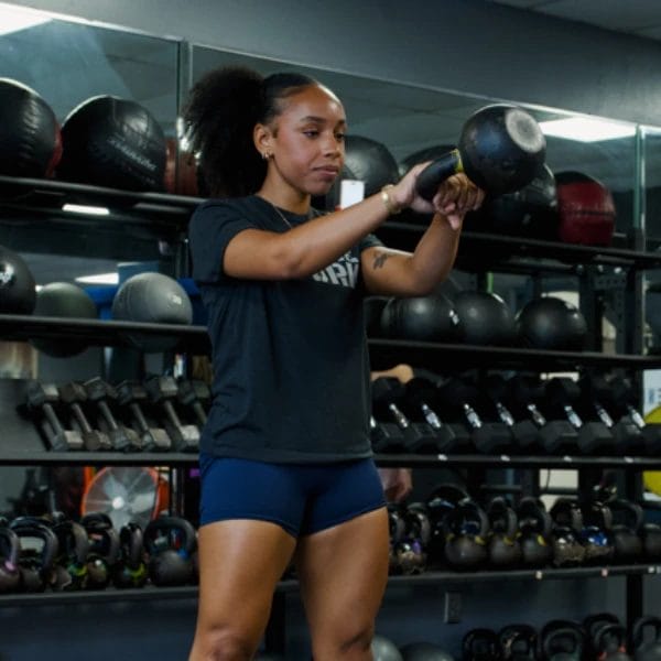 Woman lifting kettlebell